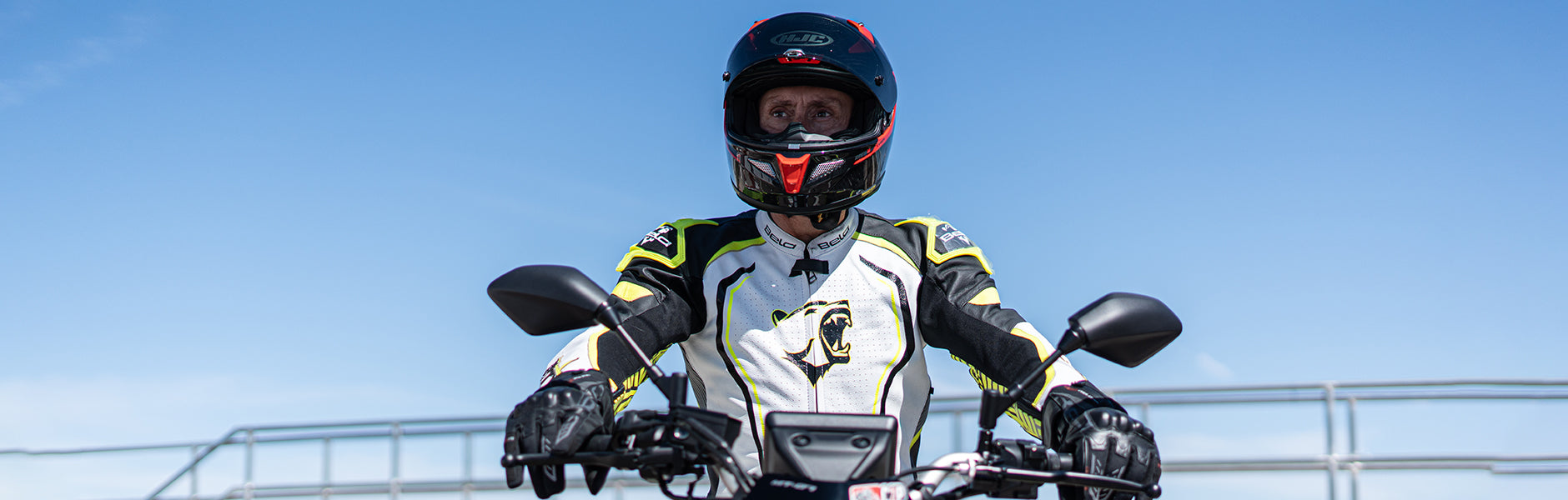 Outfitted bela motorcycle suit while riding on a race track